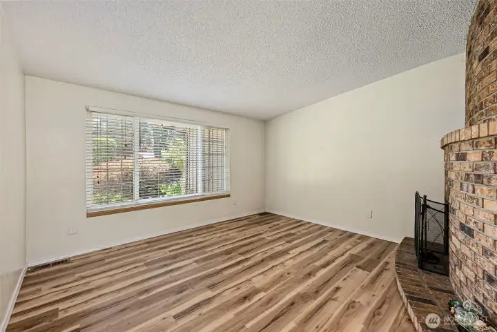 Open area living room that allows for different ways of arranging your furniture to fit your style