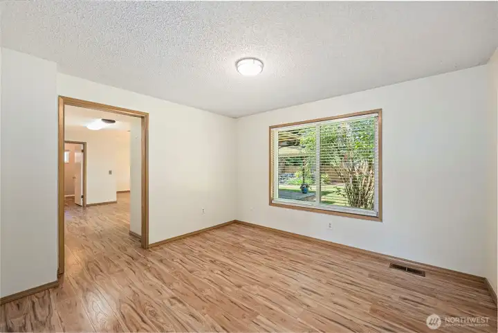 Dining area  with window that also looks out onto the lovely back yard