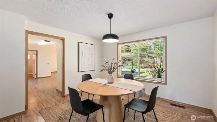 Dining area virtually  staged.