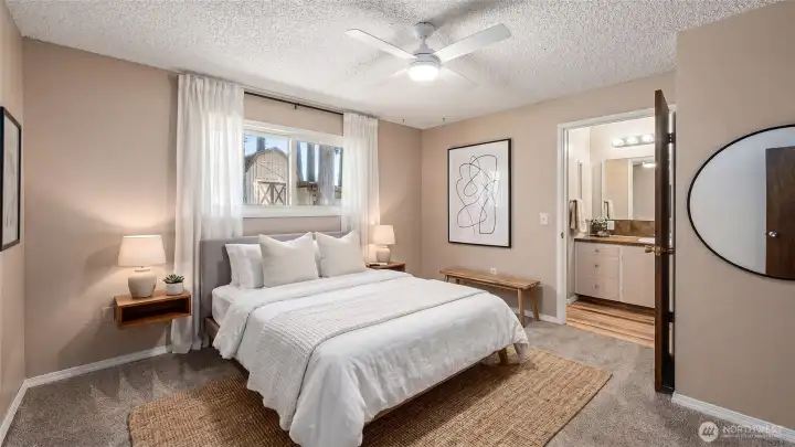 Primary Bed/bath virtually staged
