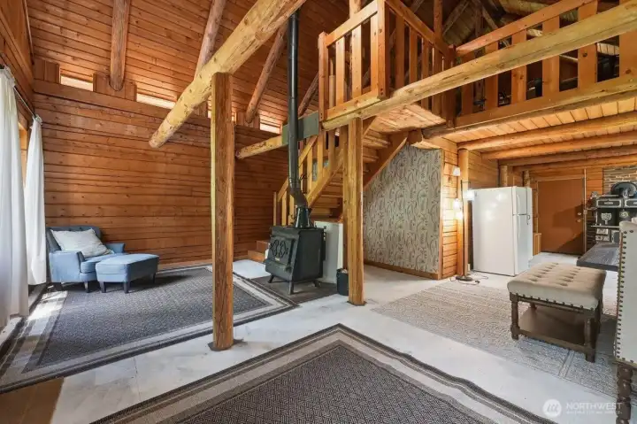 Family room area with woodstove for additional heating source.