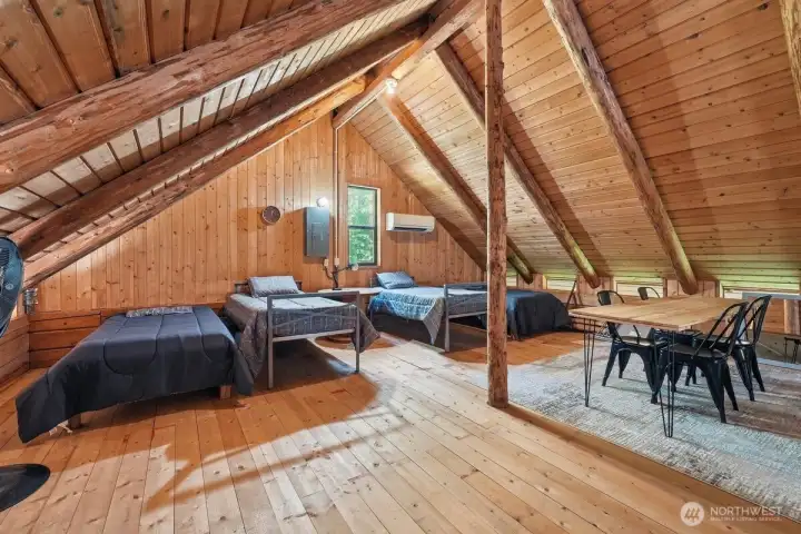 Whether used as a bunk room, guest retreat, or large bedroom, the loft delivers versatility