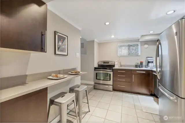 Lower level kitchen is perfect for multigenerational living or mother-in-law.