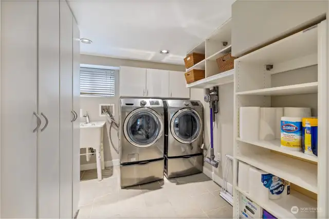 Laundry room with tons of extra storage space.
