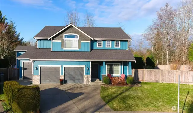 2614 Sq ft (with added loft square footage (permitted) from addition)  House is all cement board siding.  Exterior painted in 2017