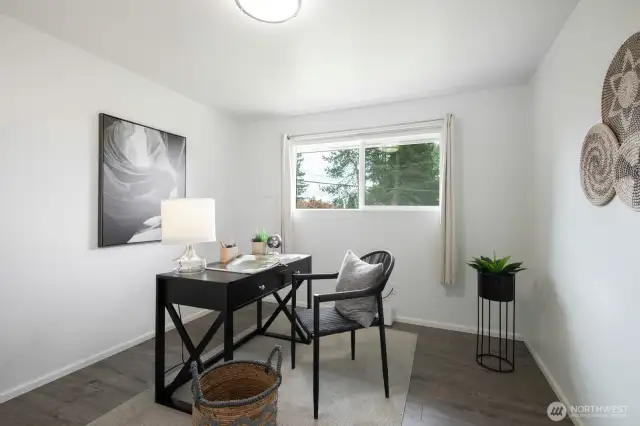 The third bedroom offers added space and versatility—perfect as a guest room, home office, or creative studio.