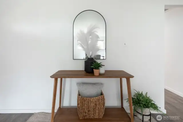 Step inside to a thoughtfully designed entry nook—ideal for coats, shoes, or future built-ins.