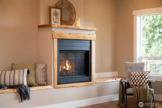 Gas fireplace with live-edge mantel and benches