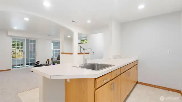Daylight basement with kitchenette, the possibilities are endless with his space