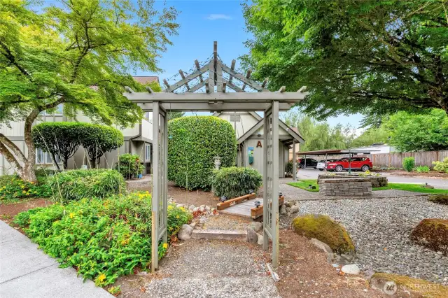 Landscaped area out front of unit
