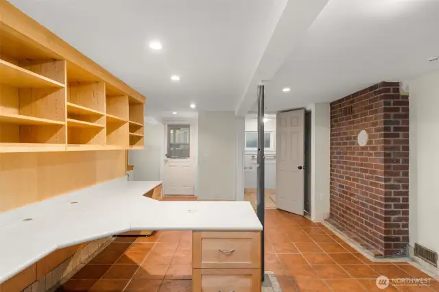 Daylight basement with separate entrance, bedroom, bathroom, laundry room, tons of storage.