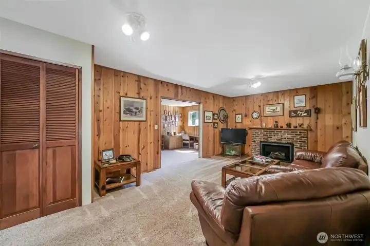 Family room area includes gas fireplace.