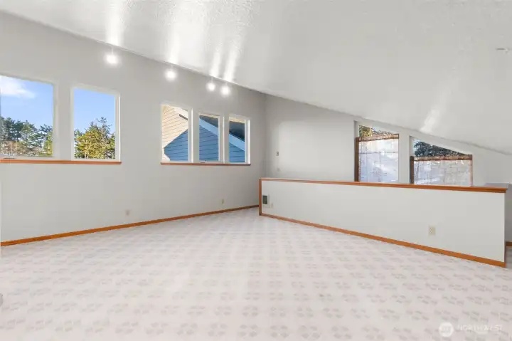 SUPER BONUS - Large finished room over garage with its own entrance