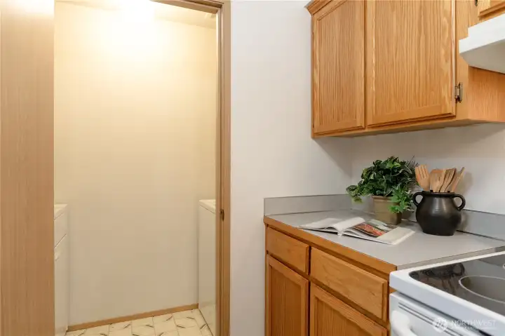 Utility Room complete w/WD - tucked at the end of your galley style kitchen.