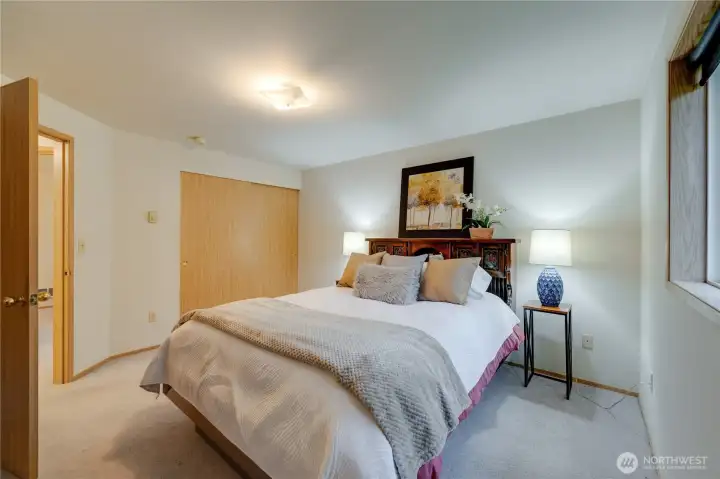 Across the hall from Bedroom #3 , Your Primary Suite