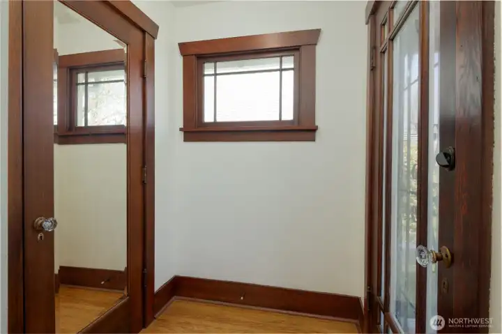 Perfect entry with original glass window, real hardwoods and glass doorknobs.