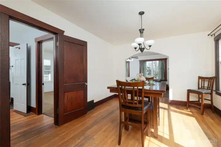 Hall to the left accesses the two bedroooms, bathroom and door to the unfinished baement.