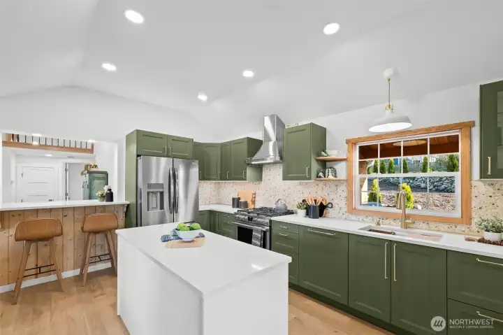 Luxury chef's kitchen with cabinet faced dishwasher (second sink & dishwasher in the butlers pantry!)