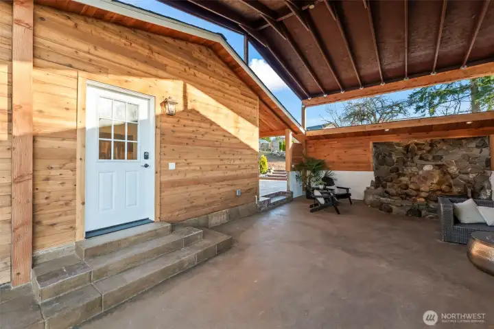 Side entrance to house under covered area