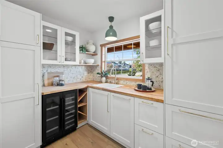 Butler's pantry!! So chic! Second sink and cabinet faced second dishwasher!!