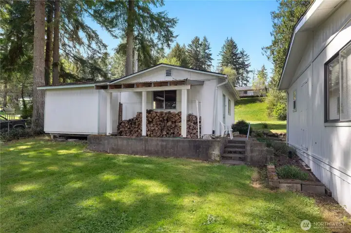 Use the detached shop for storage, projects, firewood, tools, or lake gear.