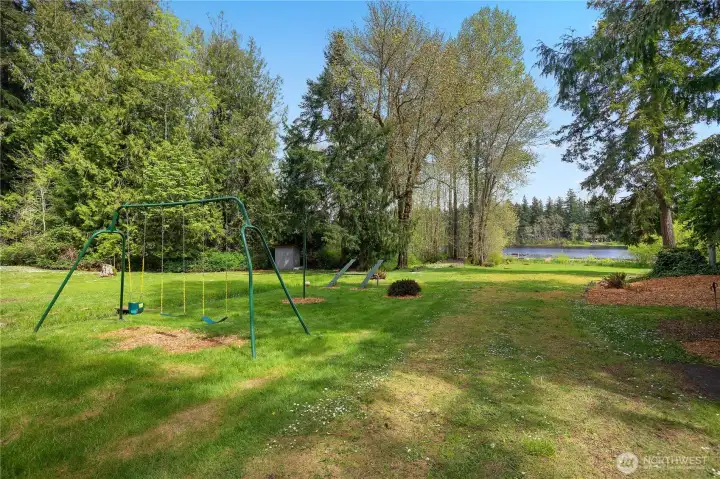Community WF Park -Enjoy the open lawn, peaceful trees, and pretty McIntosh Lake view.