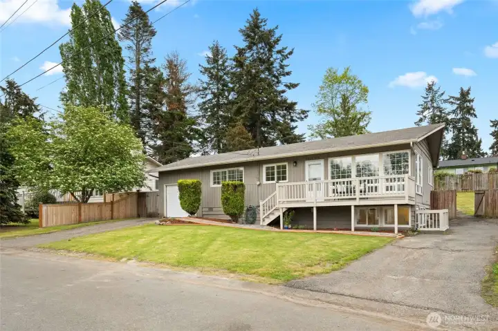 2 Driveways plus 1-car garage.  Plenty of Parking
