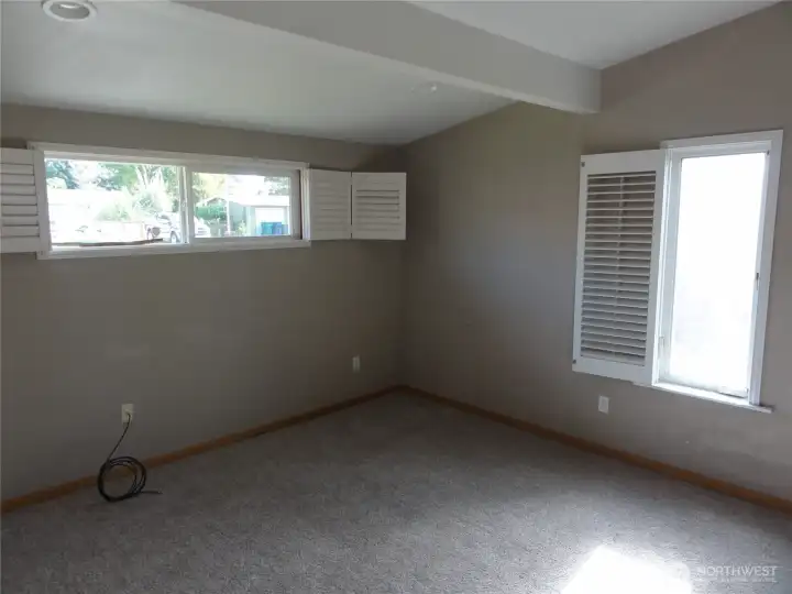 Large primary bedroom separated from the other rooms. Has its own bathroom.