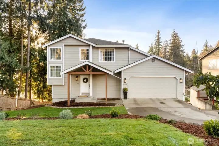 Amazing, updated western-facing Lake Tapps waterfront home with breathtaking sunsets, lake and wildlife refuge views