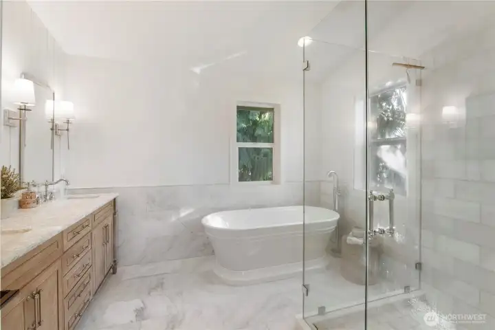 Spa primary bath with soaking tub, dual vanities and separate shower