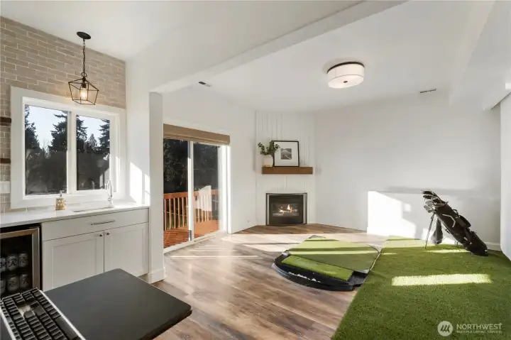 Higher ceilings in the basement are perfect for golf simulator!
