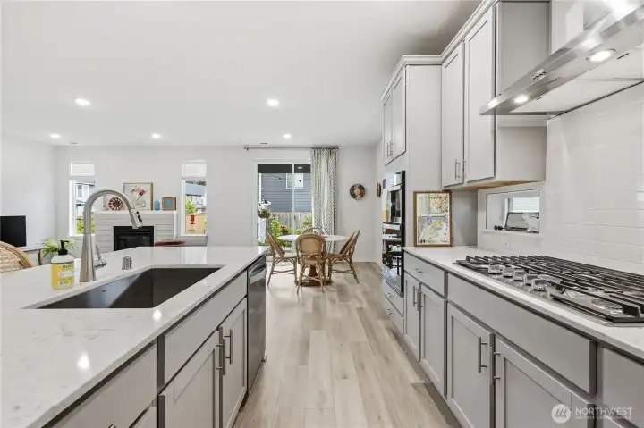 A view from the kitchen toward the dining and living area.