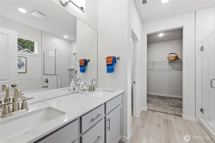 Double sink bathroom with quartz top.
