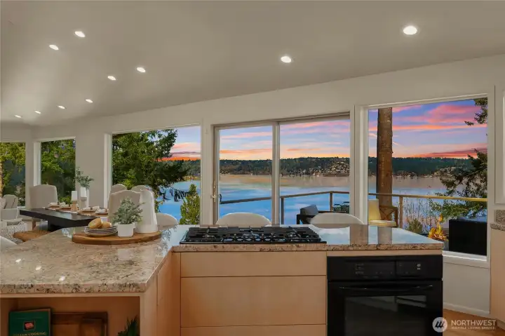 Gas cooktop and large center island with seating. Gas cooktop and large center island with seating.