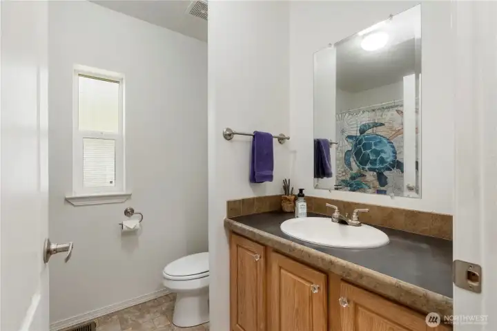 Full bathroom with bathtub and shower Full bathroom with bathtub and shower