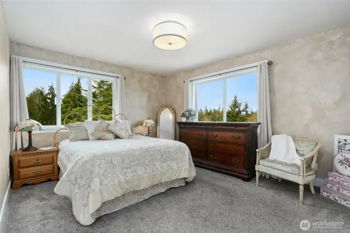 2nd bedroom upstairs. Lots of windows and light.
