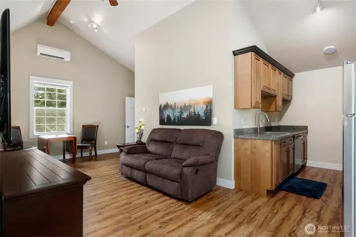View of living rm & kitchen in apartment over garage