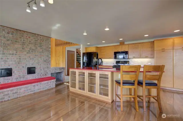 Russian fireplace with bench seat in dining room.