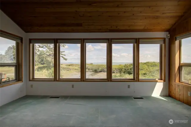 Living room looks out to the estuary and Bay.