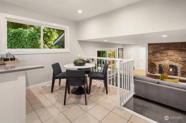 The kitchen eating nook with adjacent family room.