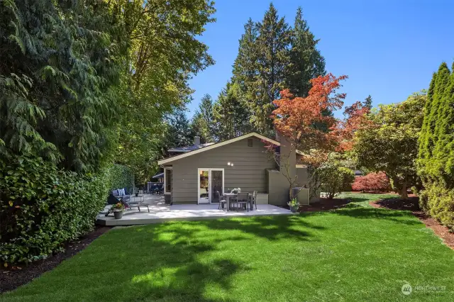 A large level lawn provides ample space for recreation and play while the incredible 970 sq ft wrap-around deck provides the ideal setting for BBQ's and outdoor entertaining on a grand scale.