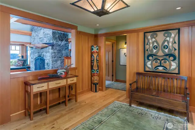 Spacious entry with madrona floors and straight grain fir woodwork.