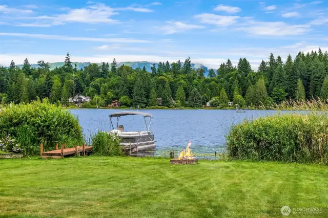 Scenic 75' of no-bank waterfront with dock