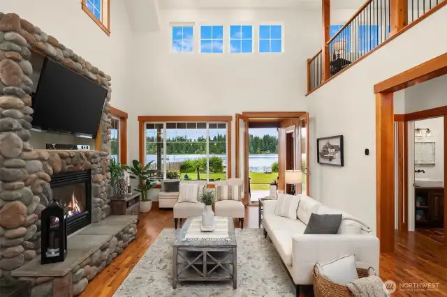 Soaring open-beam ceilings and clerestory windows. Open loft above.