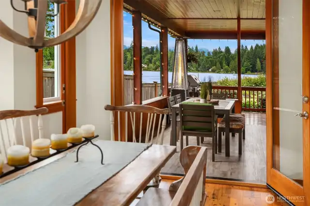 Dining room with French doors to covered deck.