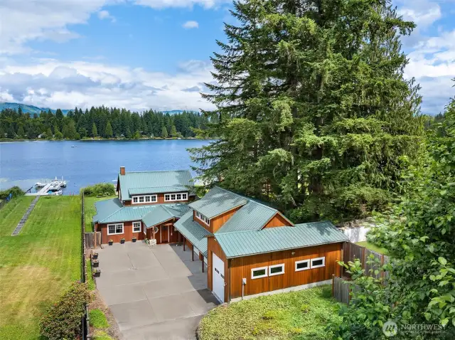 Huge 1500SF 4 Car garage with dedicated RV stall with oversized door access. Unfinished 1,000 SF space above to customize.