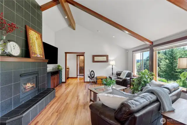 Great room with stone fireplace & built-ins, wired for sound