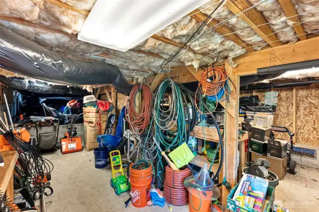 Work shop under the home is approx 450 sq ft & has a wine room & more crawl space for storage