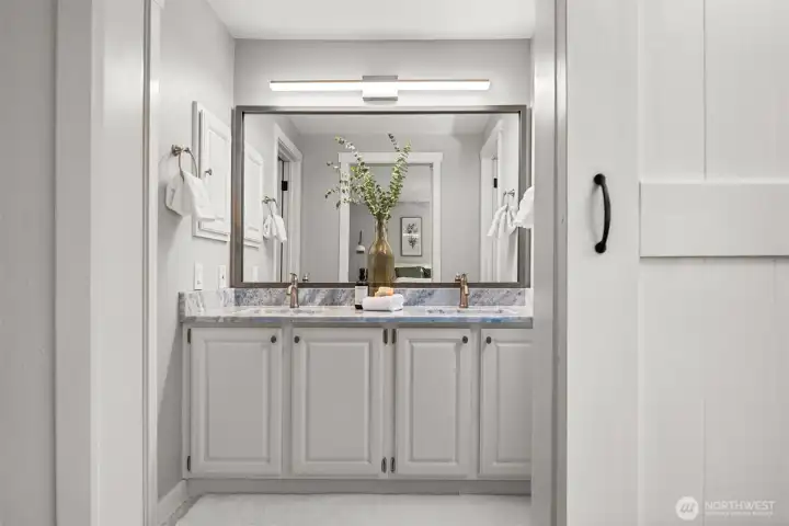 A walk-in closet and ensuite bath make this space a true getaway.
