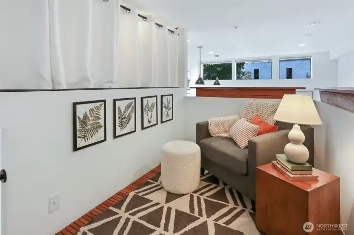 Reading room, office, DJ booth, extra storage, music room - this space is super versatile.